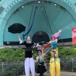 Stilt-walkers perform at Francofest Hamilton 2025