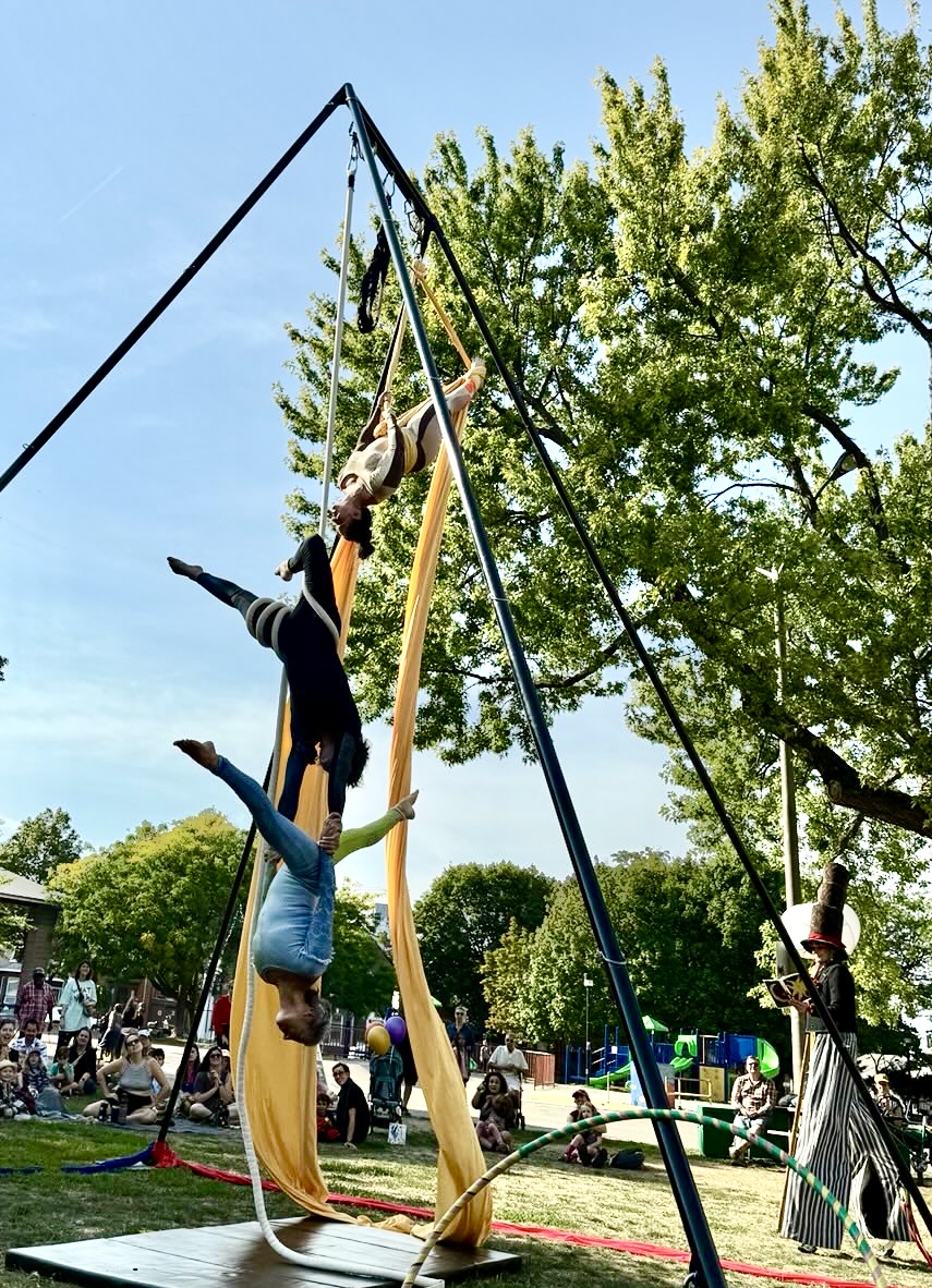 3 aerialist and a stilt-walker bring circus to the community in East Hamilton